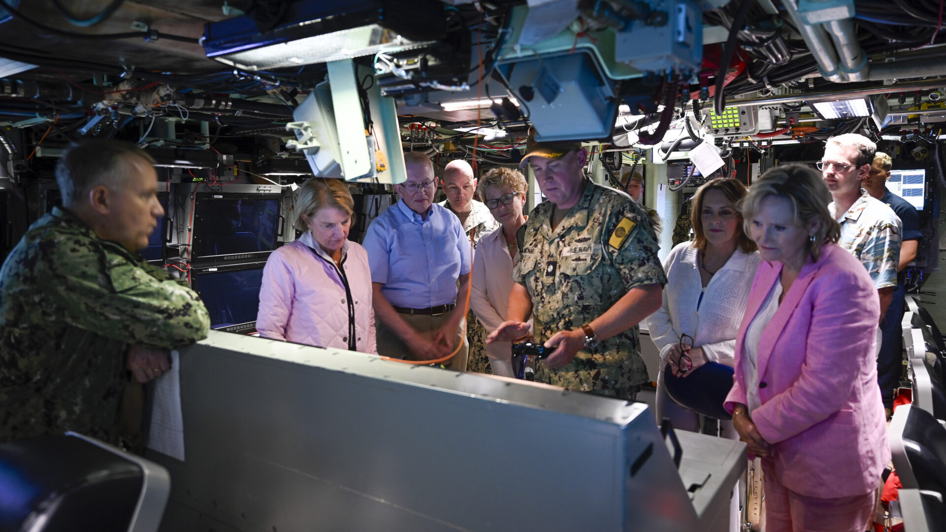 JOINT BASE PEARL HARBOR-HICKAM (Aug. 9, 2023) Sen. Shelley Moore Capito (R-WV), Rep. Chrissy Houlahan (D-PA-6), Rep. Kathy Castor (D-FL-14), and Sen. Cindy Hyde Smith (R-MS) are briefed in the control room of the Virginia-class fast-attack submarine USS Illinois (SSN 786) by Cmdr. Daniel McNab, IllinoisÕ commanding officer, during a tour Aug. 9, 2023. The Pacific Submarine Force provides strategic deterrence, anti-submarine warfare; anti-surface warfare; precision land strike; intelligence, surveillance, reconnaissance and early warning; and special warfare capabilities around the globe.(U.S. Navy photo by Chief Mass Communication Specialist Amy Biller)